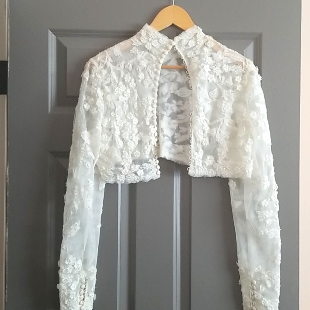 Justin Alexander wedding lace sleeved capelet